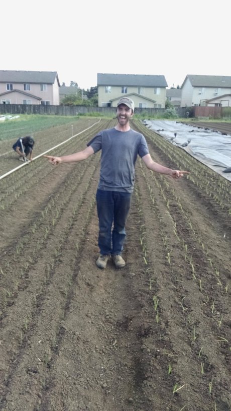 Phil celebrating the end of onion planting for the day