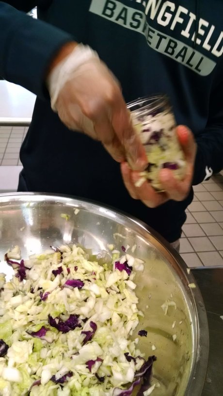 Packing cabbage for sauerkraut